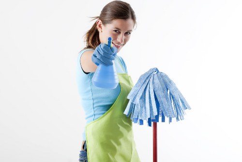 Professional cleaner in Surrey preparing a spotless home interior