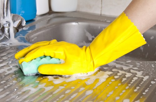 Staff member trained in safe carpet cleaning procedures