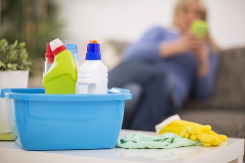 Commercial cleaner in Surrey maintaining a bright office workspace