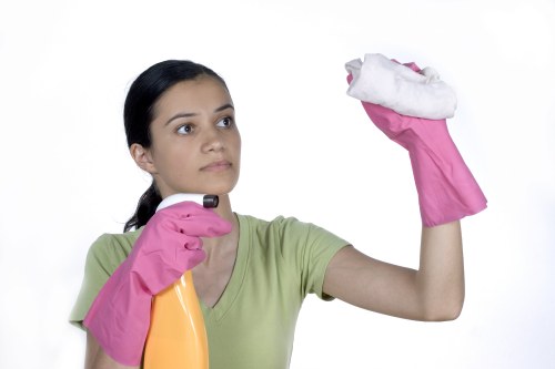 Surrey office cleaning team sanitising shared workspaces